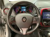 the interior of a car with a steering wheel and dashboard controls