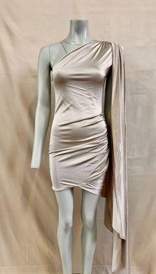 an image of a mannequin dressed in a beige dress