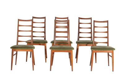 set of four dining chairs with green upholstered seats