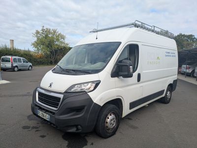 the white van is parked in a parking lot with other vehicles