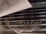 a sheet of paper sitting on top of an oven