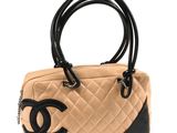 chanel beige and black quilted quilted leather handbag