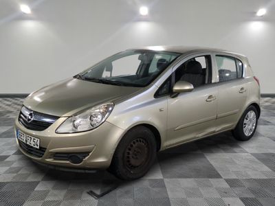 a picture of a silver car parked in a garage