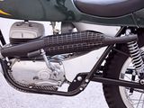 a close up of a motorcycle parked on the side of the road
