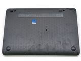 the bottom of a laptop with a blue sticker on it