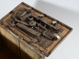 a wooden box with a bunch of tools inside of it