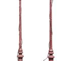 pair of pink street lamps with white globe lamps on each of them