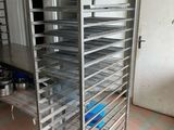 an image of a kitchen with a rack of food in it
