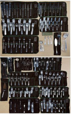 many different types of knives and spoons in this picture