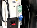 a close up of a gas pump with a hose attached to it