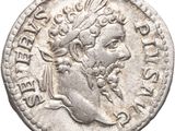 a silver coin with an image of a man on it