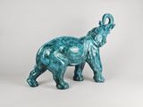 an elephant figurine with a blue patt finish on it ' s body