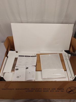 a cardboard box with a bunch of papers inside of it