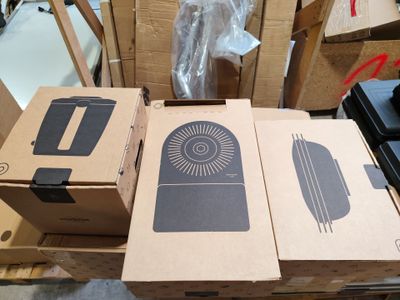 several cardboard boxes are stacked on top of each other on a pallet