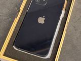 an iphone is in a box on a concrete surface