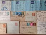 many different types of old postcards on the table