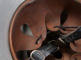 a close up view of a metal object with scissors in it
