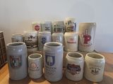 a lot of coffee mugs sitting on a table