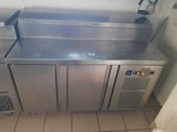 a stainless steel counter in a commercial kitchen