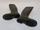 pair of brown rubber boots on a white surface