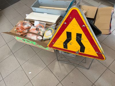 a table that has a sign on it that says turn left