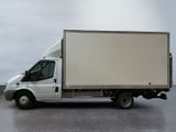 a white truck that is parked in a parking lot