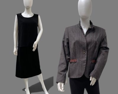 two mannequins dressed in black and grey clothing standing next to each other