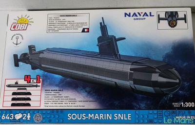 the box is open to show the model of a submarine