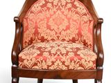 an image of a chair with a red and gold patterned upholstered back