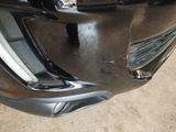 a close up of the front bumper of a car