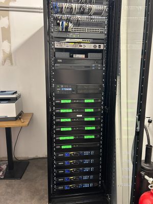 a rack with many different types of wires in it