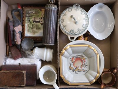 a box filled with assorted dishes and other items