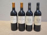 trois bouteilles de vin sont alignées sur une table