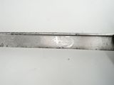 a knife that is hanging on a wall