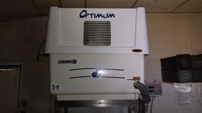 an image of a white refrigerator with a sign on it