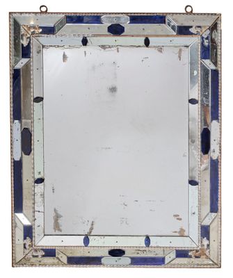 an image of a mirror with blue and white mosaics on it