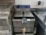an image of a commercial fryer in a commercial kitchen