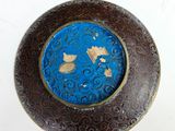two plates that are sitting on a white table