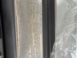 an image of a toaster oven with a plastic cover on it