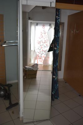 . Un miroir de porte, en l'état