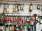 a picture of a garage with a lot of tools hanging on the wall