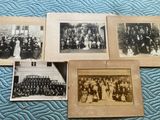 several old black and white photos of a group of people on a bed