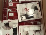 several boxes of red and white shirts are stacked on top of each other