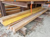 several pieces of wood are stacked on top of each other