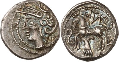 a silver coin with an image of a woman and a man on it