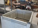 an image of a large white box in a warehouse