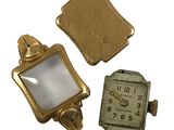 three pieces of jewelry that include a gold watch and a square watch