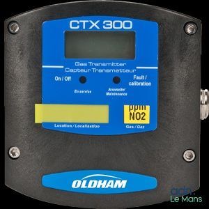 a close up of a digital temperature controller on a black background