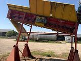 an image of a tractor that is parked in a field