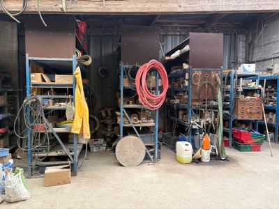 a garage filled with lots of tools and supplies